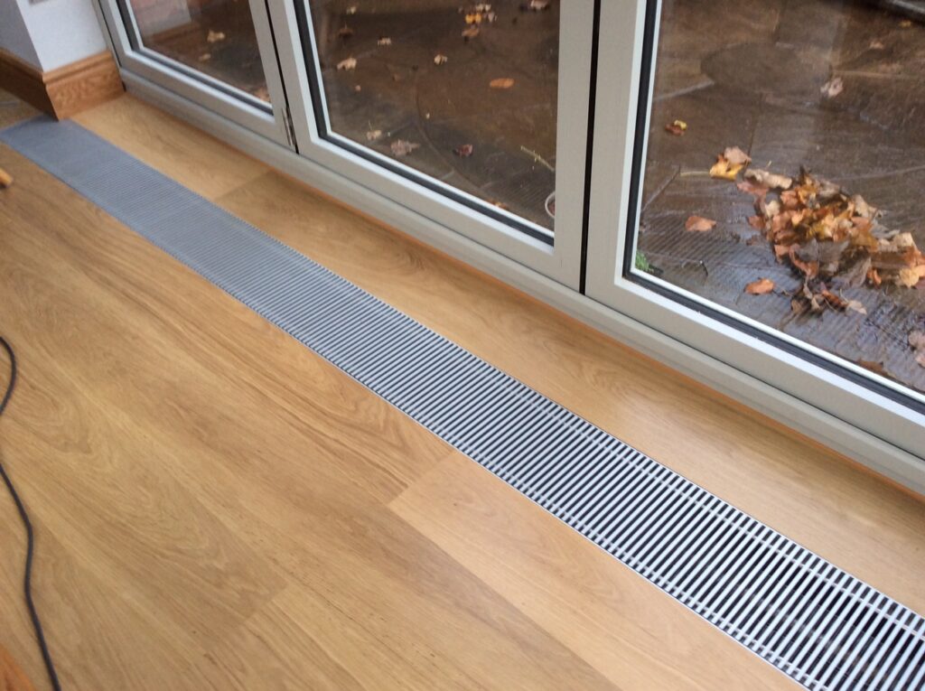 Trench Heater picture with wood flooring